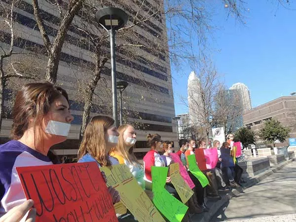 Students with Campus Pride protest the recent action of city leaders and inaction of state leaders on Dec. 22 in Charlotte. - RYAN PITKIN