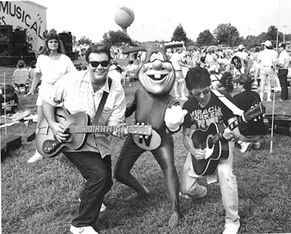 Fred Mills (right) and editor John Grooms rock  out at a CL function back in the day