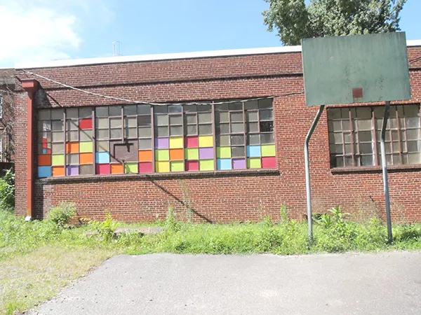 A basket-less basketball goal at the present-day Morgan School site. (Photo by Ryan Pitkin)