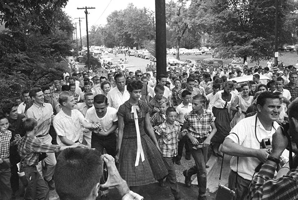 A teenaged Dorothy Counts walks to Harding High School in 1957. (Photo courtesy of the Charlotte Observer)