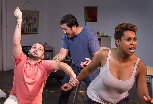 Stephen Seay, Stephen West-Rogers and Ericka Ross flail about during the "Runt" rehearsals. (Photo by Chuck Bludsworth)