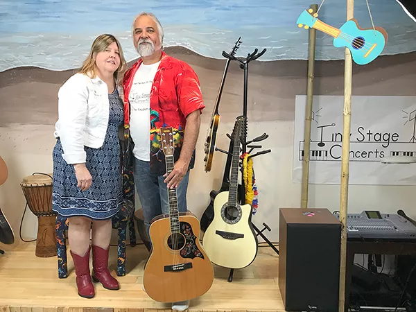 Karen Butler and Louis Beeler on their tiny stage. (Photo by Mark Kemp)