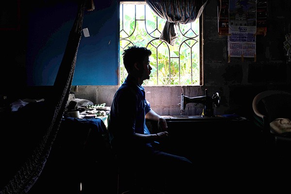 Pedro Salmeron spends much of his time in his home since being deported, as he’s afraid to venture outside. (Photos by Jonathan Funes)