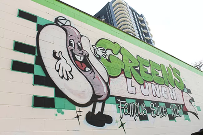 A mural stands in for the original sign, which is too faded to read. (photo by Alexandria Sands)