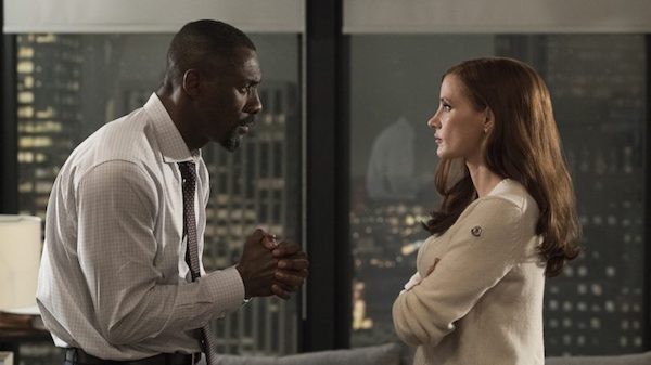 Idris Elba and Jessica Chastain in Molly's Game (Photo: Universal & STX)