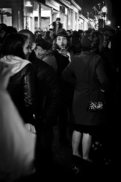A midnight kiss on Wall Street at Uptown Kingston's 1913 New Year's Eve Celebration. - ANDREW MACGREGOR