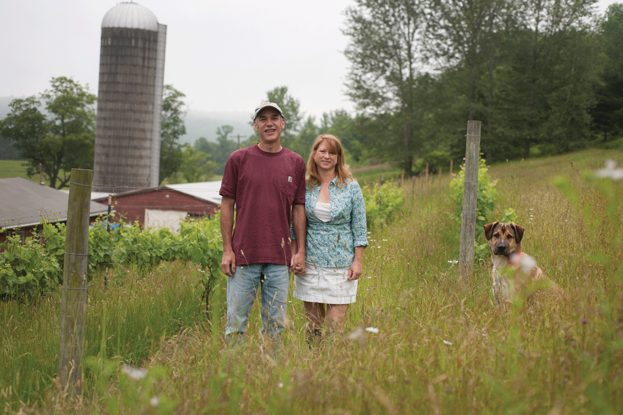 Andrew Scott, Jennifer Clark, and Lester outside the Eminence Road Farm Winery in Long Eddy. - ROY GUMPEL