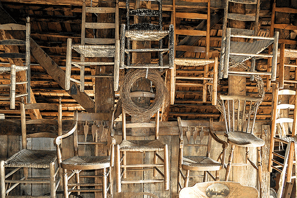 Antique chairs in attic storage, Warwick Historical Society. - DAVID MORRIS CUNNINGHAM