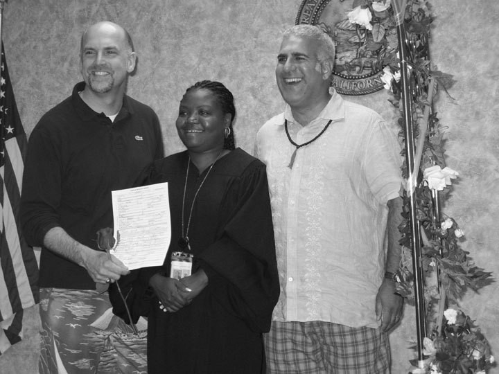 Brook Garrett (holding license) and Jay Blotcher were married by Sharese Bydon, deputy commissioner of Los Angeles County, on July 11, in the - wedding chapel of the county registrar office. - HANK  DONAT