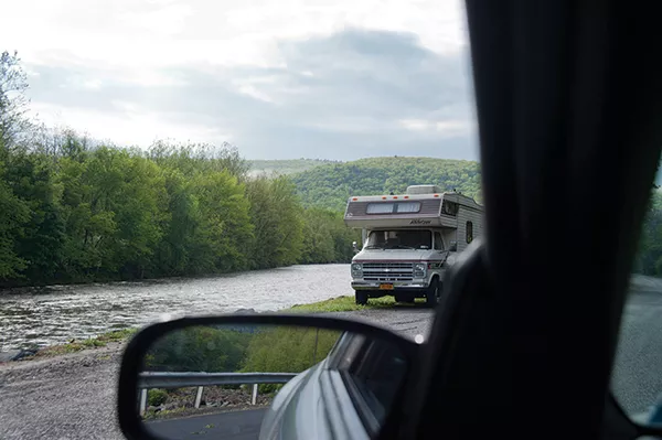 Camper on Esopus creek in Mount Tremper.