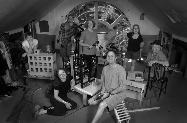 Cave Dogs in their Bloomington studio (back row): Amy Schoonover, Jeremy Holmes, Suzanne Stokes, Michelle Hughes, Dan Getman; (front row) Tracey Leavitt, Jim Fossett.