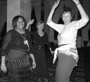 Conference attendees let loose to the rhythmic vibes.