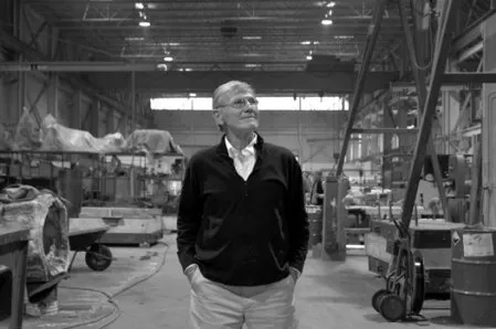 Dick Polich standing in the midst of the artful world he's created. - HILLARY HARVEY