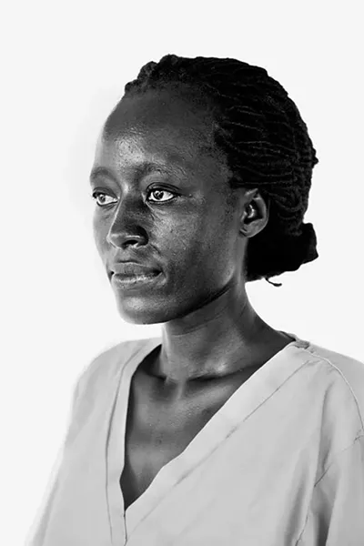 From the exhibit “Braving Ebola,” a portrait of Kenyan emergency nurse Pares Momanyi, 30, at the Bong County Ebola Treatment Unit in Suakoko, Liberia, on October 12, 2014. - DANIEL BEREHULAK FOR THE NEW YORK TIMES/GETTY IMAGES