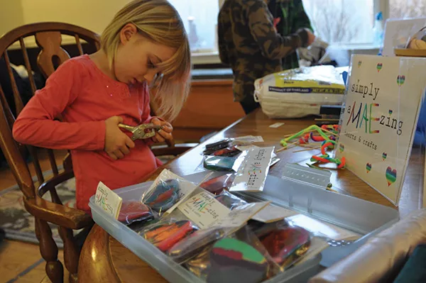Mae Gallagher prepares crafts for the Hudson Valley Sudbury School’s craft sale. - IMAGE PROVIDED