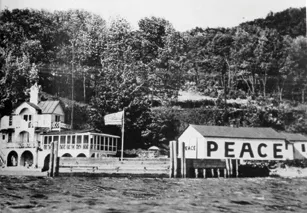 Many Divine settlements were easily identified by the word “peace†appearing on buildings, such as this barn in west park circa 1941 - JENNIFER MAY