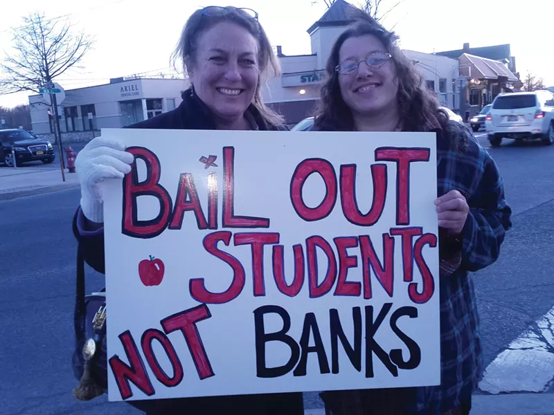 New Paltz Town Supervisor Susan Zimet and Amanda Sissenstein of Occupy New Paltz at the #Occupy Education March and Rally in downtown New Paltz on March 10. Photo: Michelle Ridell.