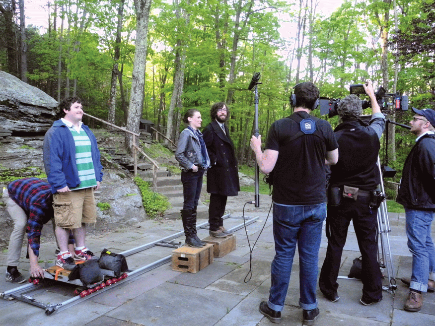 On the set of Doomsdays, a madcap comedy about doomsday-obsessed vagabonds in the Catskills, written and directed by Eddie Mullins, co-owner of Kingston’s One Mile Gallery. The film, which was shot at locations across Ulster County and the Catskills, stars Laura Campbell and Justin Rice, pictured above. Photo by Kelly Merchant - JIM RICE