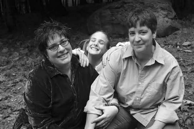Peri Rainbow-Sloan, Cecilia Rainbow-Sloan, and Tamela Rainbow-Sloan outside their home in October, 1994.