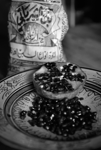 Plucked pomegranate seeds on a bowl the McMorrows purchased in a market in Israel. - JENNIFER MAY