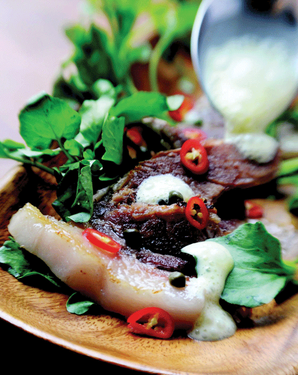 Pork and watermelon salad from Pelaccio’s “Eat with Your Hands.”