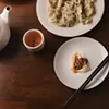 Pork dumplings with spicy sauce at Palace Dumpling in Wappingers Falls. Pork dumplings with spicy sauce at Palace Dumpling in Wappingers Falls.