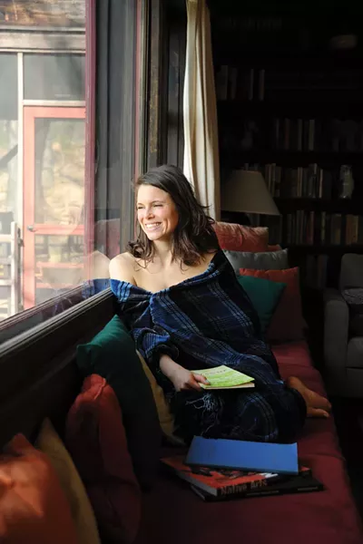 Study in Chenille - Alexis Sarandon is wearing a couch throw in Neptune from Loominus in Woodstock. - KELLY MERCHANT