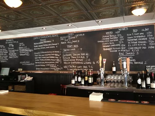 The elegant wine bar and chalkboard menu at Bread & Bottle