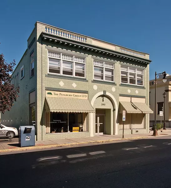 The exterior of the dual-use Morris/Strano building in Uptown Kingston. Two businesses occupy the ground floor and the family lives on the second floor. - DEBORAH DEGRAFFENREID