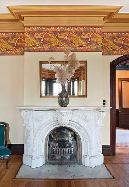 The sitting room fireplace. - DEBORAH DEGRAFFENREID