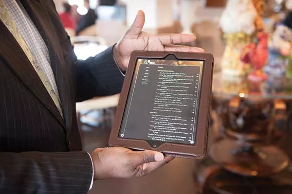 The wine list is presented to diners on an iPad. - JENNIFER MAY