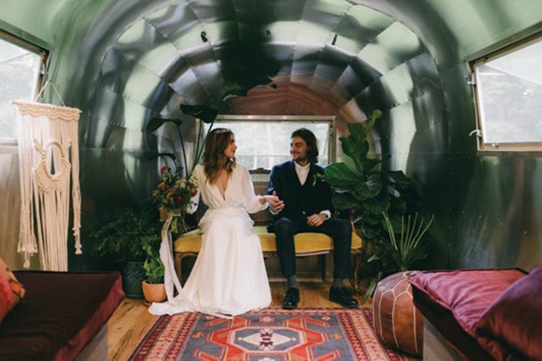 Bride and groom inside the Airstream. Photo by Quyn Duong for Rose & Dale.