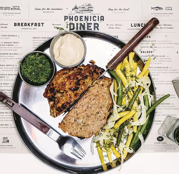 Mini herbed meatloaves served with wax beans and fennel with dill