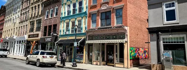 The exterior of Queen City 15 gallery.