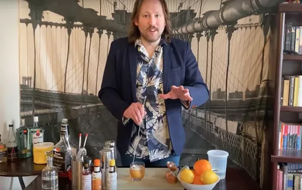 Edward Gibbons-Brown mixing up booze and humor on the set of "Cocktails for the Quarantine."