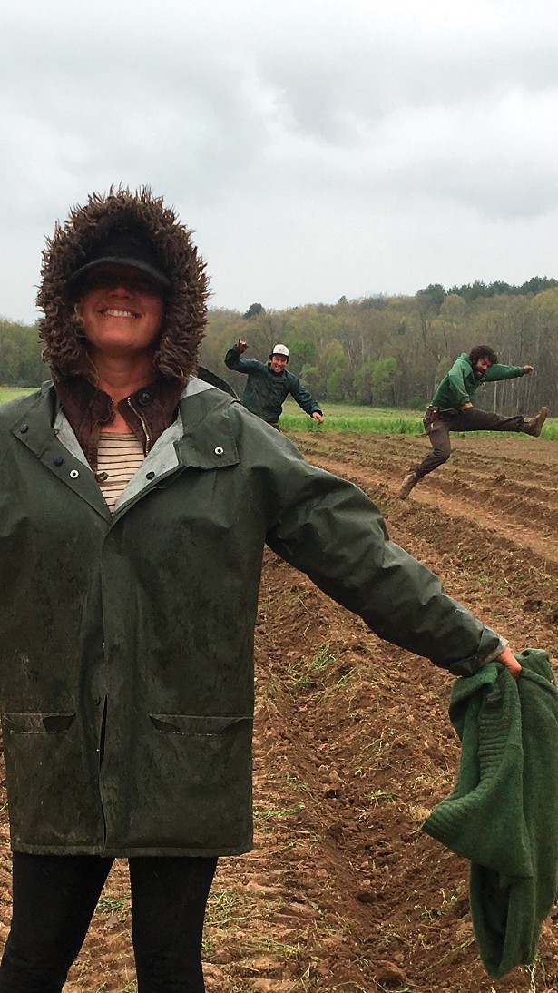 Aileah Kvashay planting potatoes at Clove Valley CSA, in collaboration with Back Home Farm.