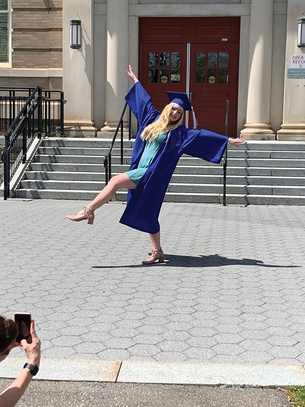 SUNY New Paltz graduate Skylar Galioto outside the Old Main Building on the New Paltz campus on Sunday, May 3.