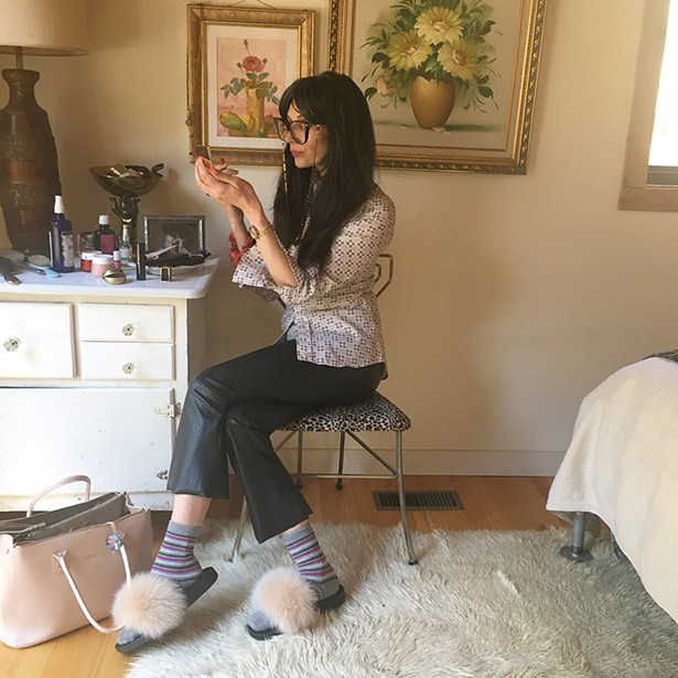 Clothing designer Stephanie Doucette gets - ready for work, which involves much time on Instagram. Doucette spends a lot of time juggling the school-based technology needs of her three children.