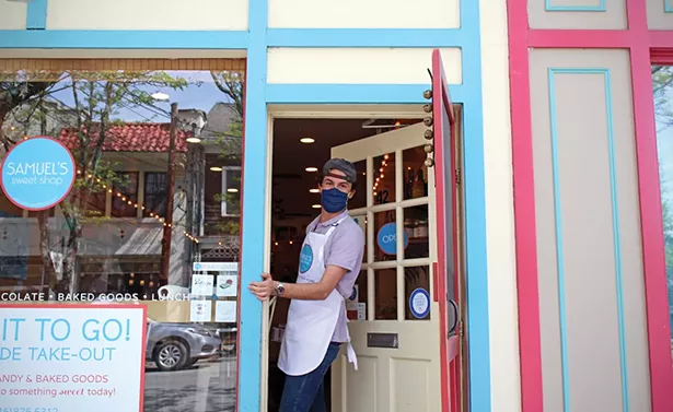 With warmer weather, Rhinebeckers are taking - to the streets, masks at the ready. - PHOTO BY ABBY FOSTER