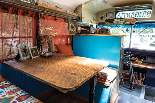 The benches in Snyder's bus were salvaged from the recent renovation of Shadowland Stages in Ellenville. - PHOTO BY WINONA BARTON-BALLENTINE