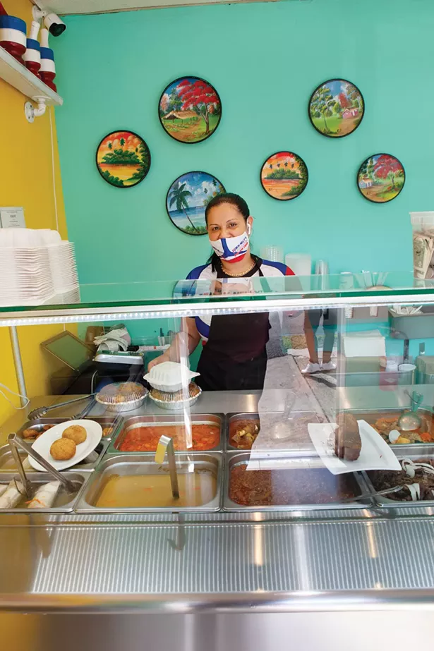 Ramona Malena serves up authentic Dominican fare like pork mofongo at New Nelly’s restaurant on Main Street.