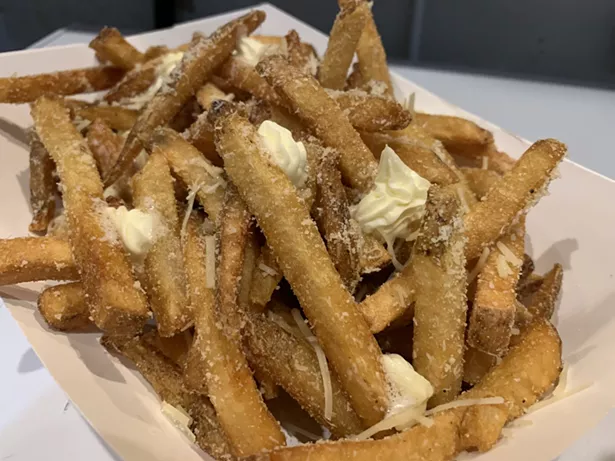 Butter Truffle Parmesan: House cut fries tossed in whipped butter, parmesan cheese, and truffle salt and topped with shaved parmesan.