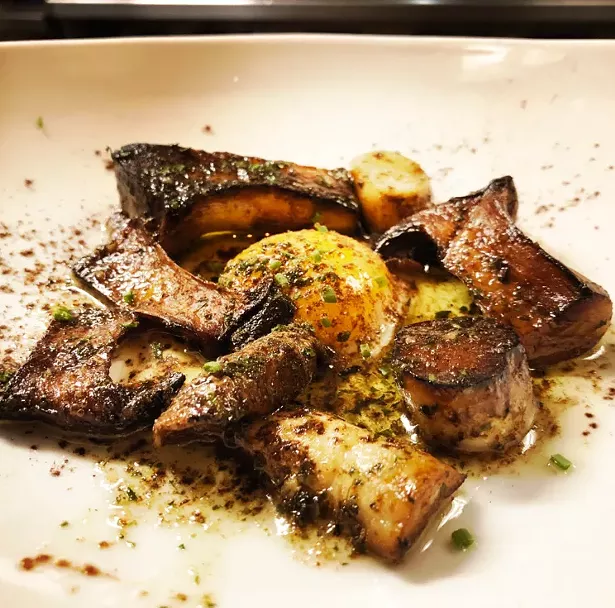 Royal trumpet mushrooms with bruléed egg yolk and porcini/cocoa dust - ALL IMAGES COURTESY OF BIA