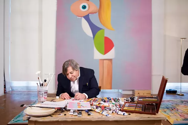George Condo in his studio working on Fashion Model, his DIY art project for Open Studio. - PHOTO BY CASEY KELBAUGH