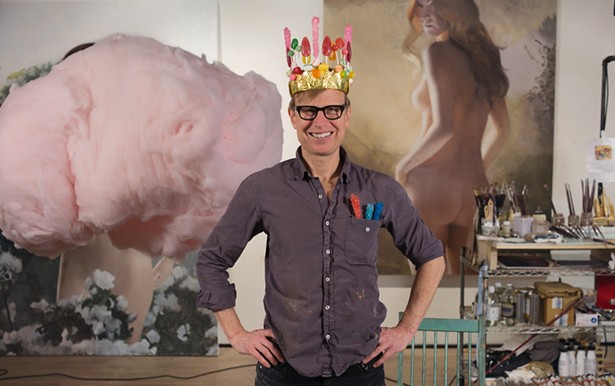 Will Cotton in his studio, wearing The Royal Crown of Candyland. - PHOTO BY CASEY KELBAUGH