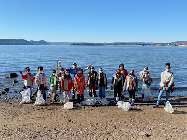A Sweep volunteer group cleans up the shoreline in Ossining - PHOTO BY ROB LOWENTHAL
