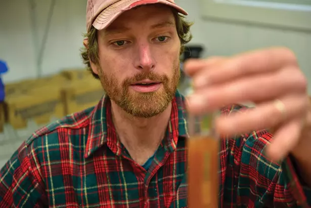 Chris Negronida, chief cider consultant at Seminary Hill Cider, in the production facility/tap room/bunkhouse in Callicoon. - ERIC LEWANDOWSKI