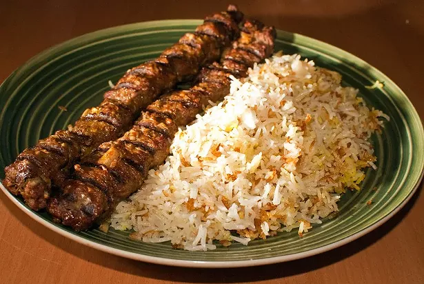 Beef Koobideh made on a grill, served with a Persian style basmati rice. - MATTHEW MENDOZA CC 2.0