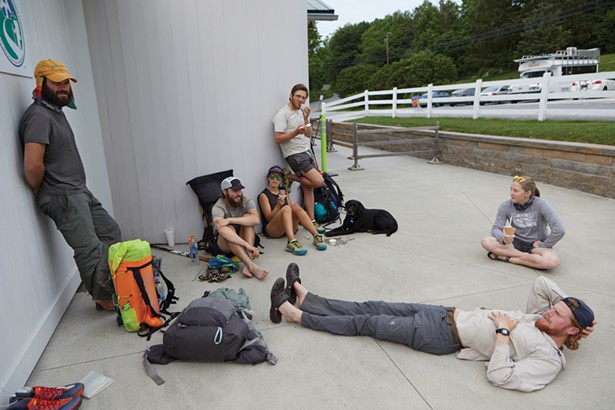 Appalachian Trail thru-hikers at Bellevale Farms Creamery. These are their hiking names from left to right: Bare Paw, Lebowski, Dash, No Name, Aurora (the dog), Anna, Zero. - DAVID MCINTYRE