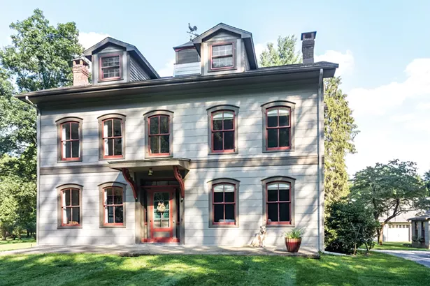 Tyreik Jackson’s 1772 Center Hall Colonial was once the center of a 160-acre dairy farm. The three-acre property features multiple outbuildings, once used for milking cows and stabling horses, which has converted into a carpentry shop and storage. - WINONA BARTON-BALLENTINE